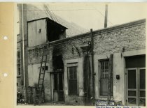Back alley view of buildings near Kress store