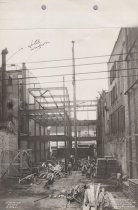 Black and white photograph of Kress construction site featuring the frame b