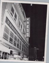 Black and white photograph of Kress light up sign