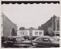 Black and white photograph of empty lot next to the Kress store