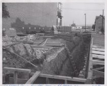 Black and white photograph of Kress construction site with the lot being cl