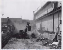 Black and white photograph of Kress construction site with the lot being cl
