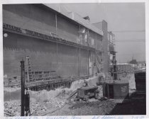 Black and white photograph of Kress construction site with the lot being cl
