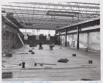 Black and white photograph of Kress construction site with the frame being