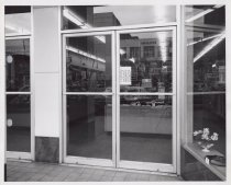 Black and white photograph of Kress main entrance