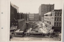 Black and white photograph of Kress construction site with foundation being