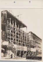 Black and white photograph of Kress construction site with frame being cons