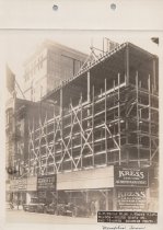 Black and white photograph of Kress construction site with frame being cons