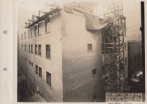 Black and white photograph of Kress construction site with walls being buil