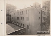 Black and white photograph of Kress store front under construction