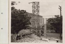 Black and white photo of Kress construction site with frame being construct