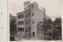 Black and white photo of Kress construction site with walls being construct