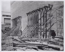 Black and white photograph of Kress construction site with the frame being