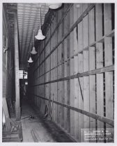 Black and white photograph of a Kress side hallway under construction