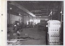 Black and white photograph of Kress construction site with workers visible