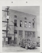Black and white photograph of Kress rear alley