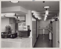 Black and white photograph of Kress diner checkout counter