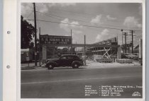 Black and white photograph of Kress construction site with the frame being