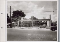 Black and white photograph of Kress construction site with the frame being