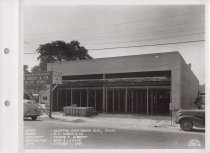 Black and white photograph of Kress construction site with the frame being