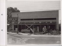 Black and white photograph of Kress construction site with the frame being