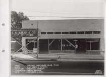 Black and white photograph of Kress construction site with the frame being