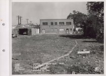 Black and white photograph of Kress construction site from the rear of the