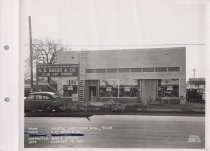 Black and white photograph of Kress store front under construction