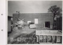 Black and white photograph of Kress construction site from the rear of the