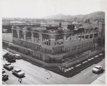 Black and white photograph of Kress exterior showing fire damage