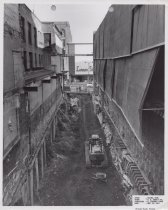 Black and white photograph of Kress side alley under construction