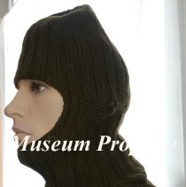 Wool knit liner to be worn under a helmet or cap.