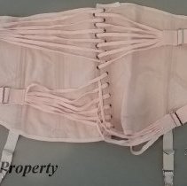 Ladies pink corset, 1890-1930 time period.