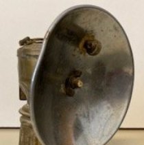 Justrite carbide lamp used by miners.