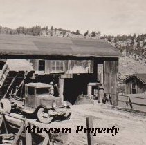 Dumping mill tailings from processing into ore bin at Katie Mill.