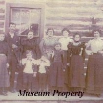 Benjamin York family standing in front of the Calvin Post Office.