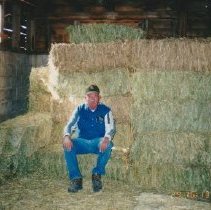 Paul Hayes inside the Hayes barn built 1946.