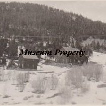 Gray Eagle bunkhouse on left and boarding house on right.