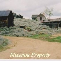 House and garage in Comet, Montana.