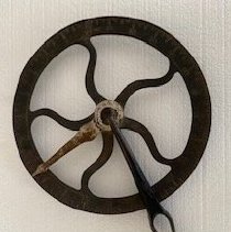 Measuring wheel for wagon wheels.