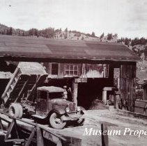 Dumping mill tailings from processing into ore bin at Katie Mill.