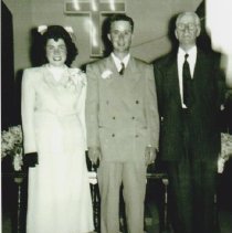 Louis Mann and Tom Battershell with Rev. Pippy on their wedding day.