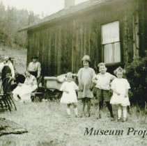 Lillian McEachern Delaney's children in front of the McEachern home.