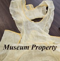 Yellow with white polkadot apron