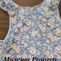 Blue apron with white flowers