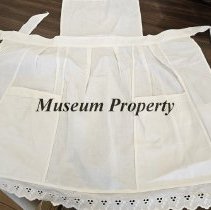 White apron with white lace