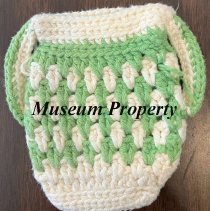 Green & White Doily in a vase design