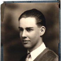 College Age Man in V-Neck Sweater