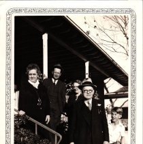 5 persons on a porch