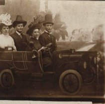 two couples in an auto